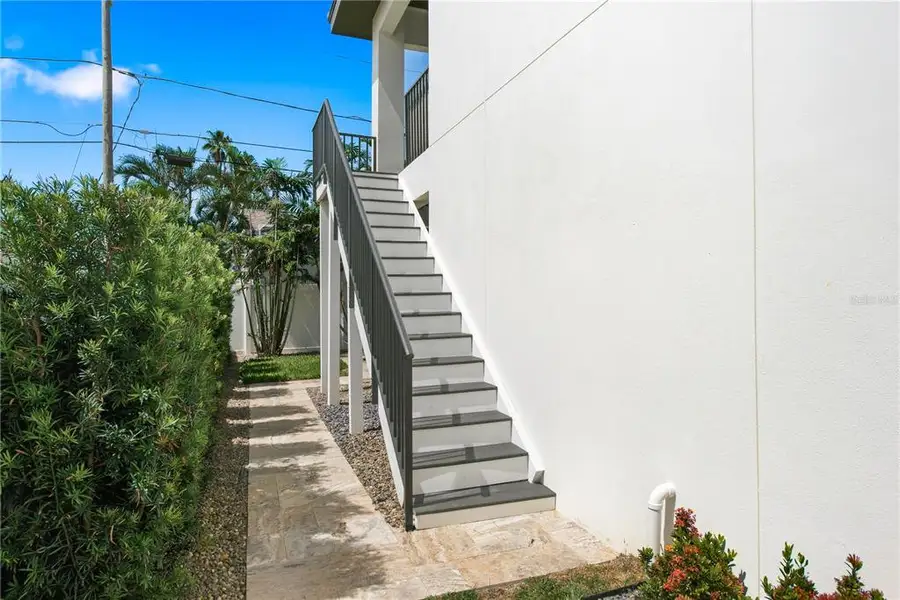 Exterior details and patio area of a home in , Belleair Beach (Image 26).