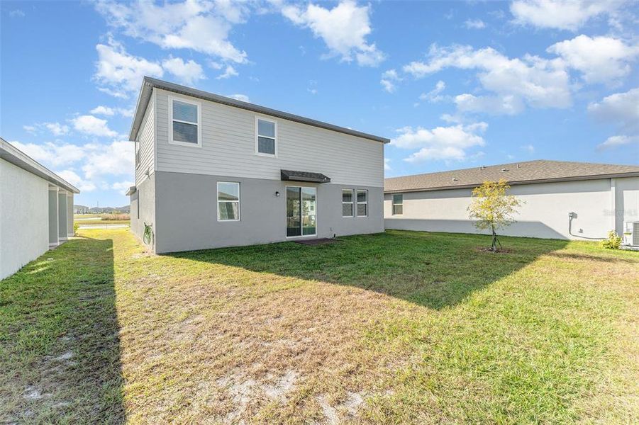 Exterior details and patio area of a home in Villamar - Signature Series, Winter Haven (Image 19).