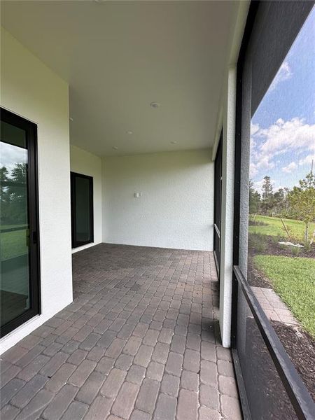 Exterior details and patio area of a home in Lakespur Wellen Park, Venice (Image 3).