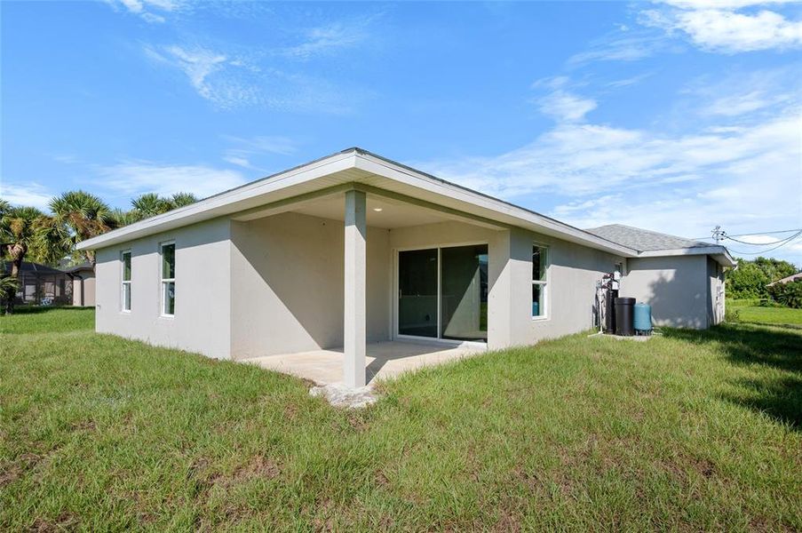 Front exterior of a new home in , North Port, FL, highlighting curb appeal (Image 13). Front exterior of a new home in , North Port, FL, highlighting curb appeal (Image 13).