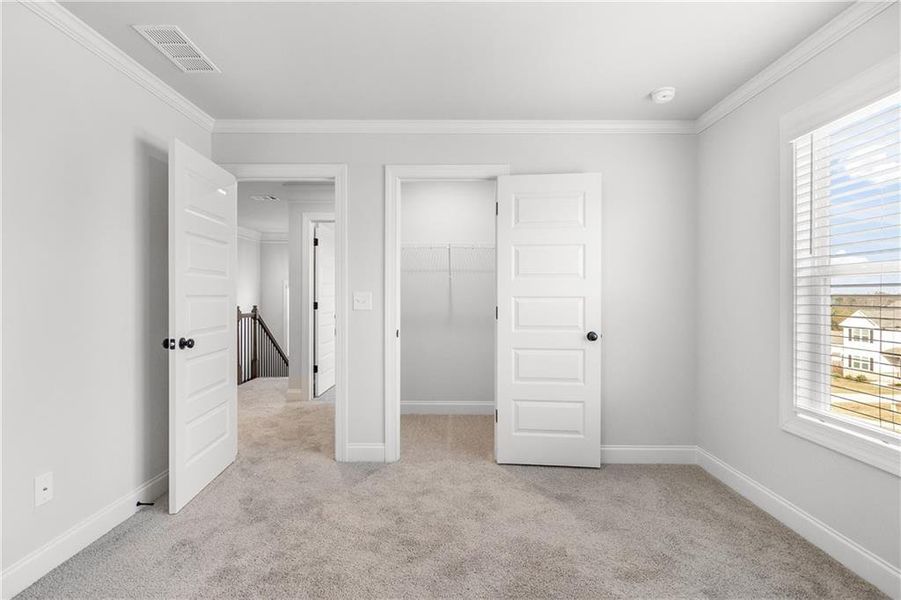 Spacious, unfurnished interior of a new home in Calgary Downs, Winder (Image 31).