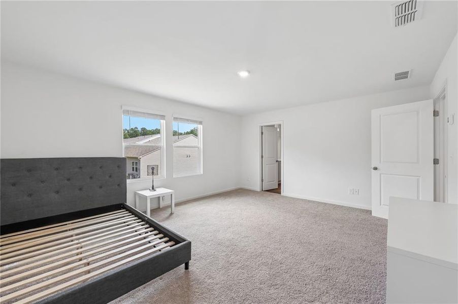 Furnished interior view inside a new home in Greyson Parc, Locust Grove (Image 15).