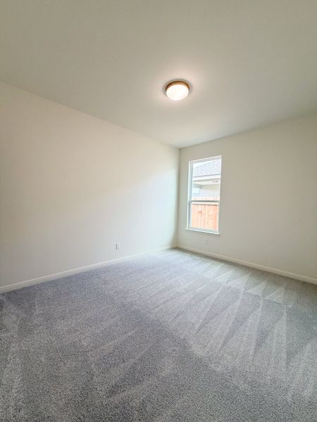Spacious, unfurnished interior of a new home in TerraVista, Victoria (Image 48).