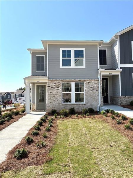 Front exterior of a new home in Stegall Village, Cartersville, GA, highlighting curb appeal (Image 35). Front exterior of a new home in Stegall Village, Cartersville, GA, highlighting curb appeal (Image 35).