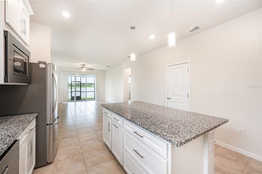 Furnished interior view inside a new home in , St. Cloud (Image 3).