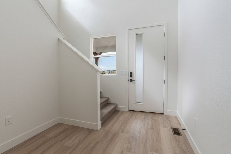 Spacious, unfurnished interior of a new home in Prairie Song, Windsor (Image 40).