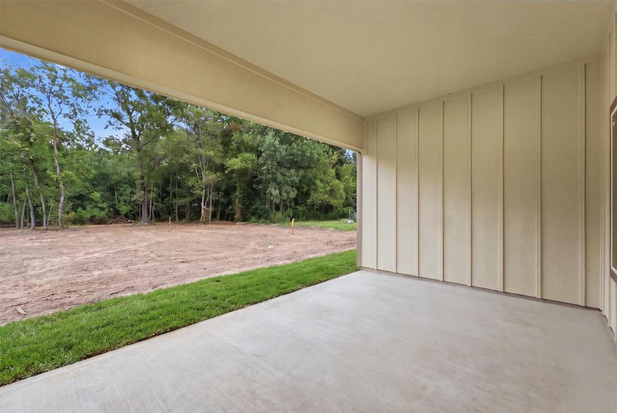 Exterior details and patio area of a home in , Conroe (Image 3).