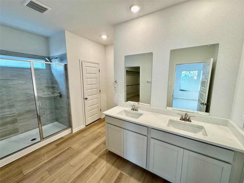 Furnished interior view inside a new home in Riverbend at Double Eagle - Boulevard Collection, Cedar Creek (Image 5).