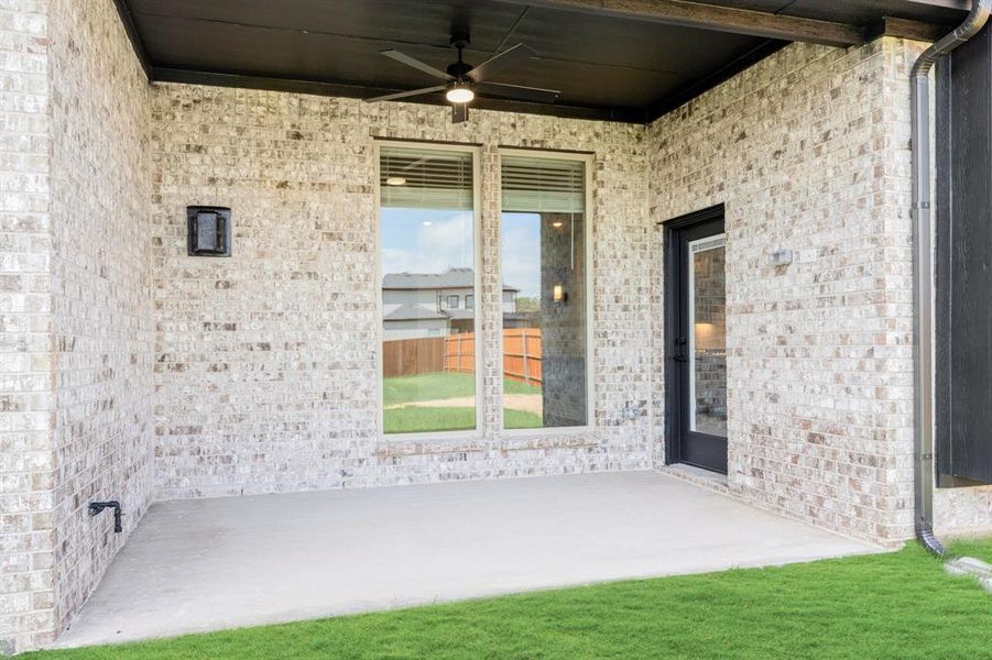 Exterior details and patio area of a home in Parks of Aledo, Aledo (Image 25).