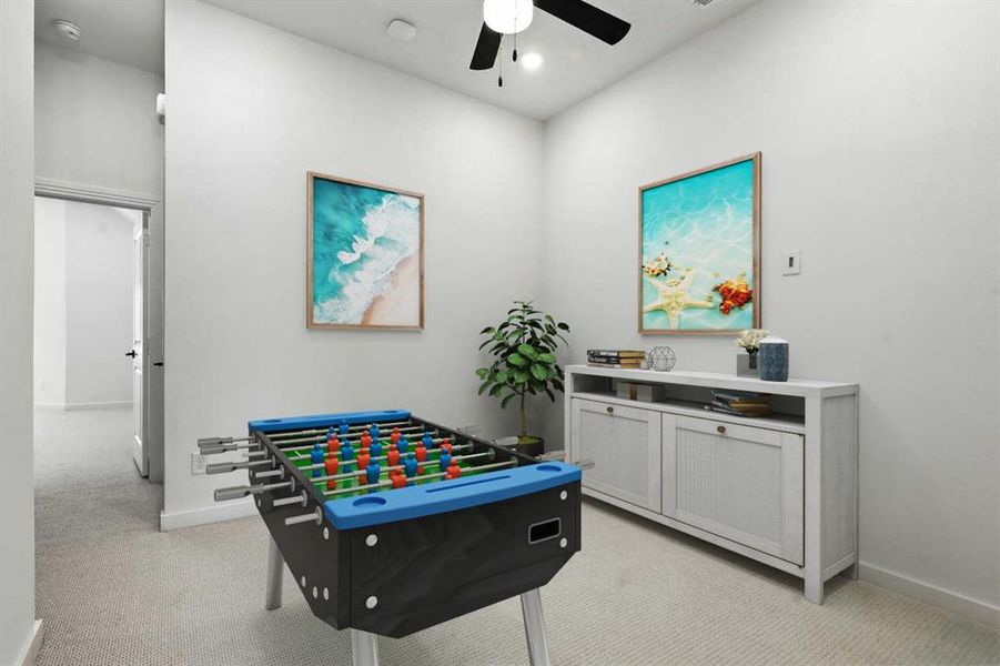 Playroom featuring light carpet and ceiling fan Playroom featuring light carpet and ceiling fan