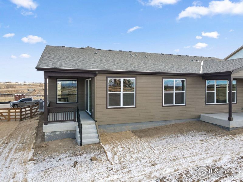 Exterior details and patio area of a home in Cordovan, Longmont (Image 4).