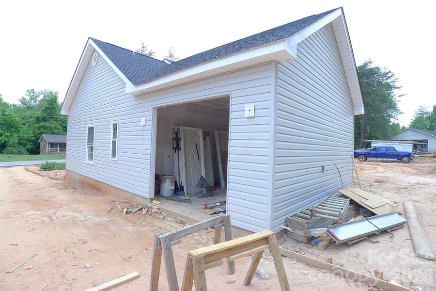 Right side of house, garage, and back of house Right side of house, garage, and back of house