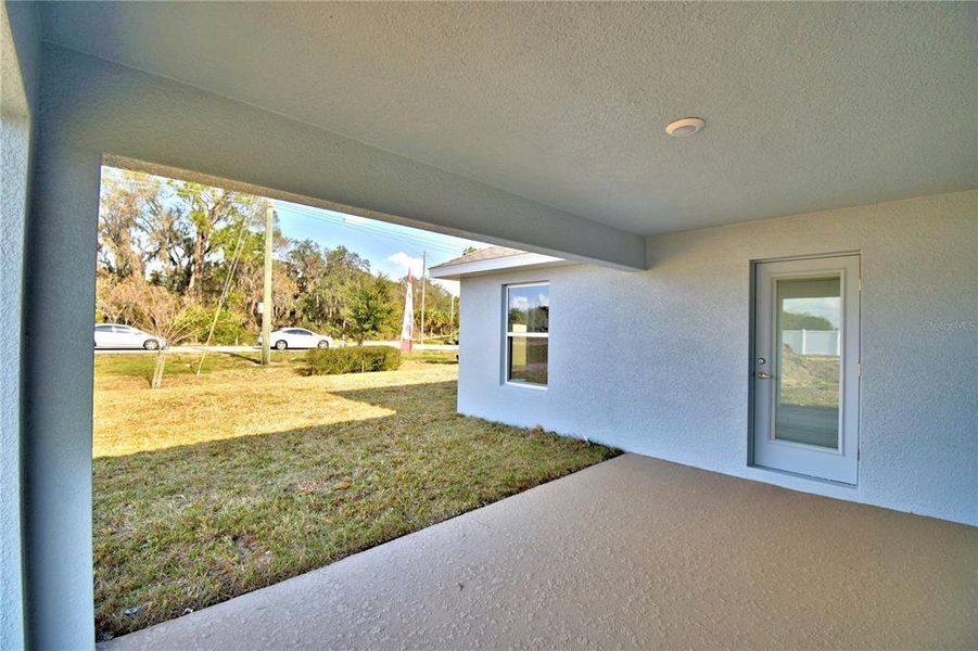 Exterior details and patio area of a home in Cadence Crossing, Auburndale (Image 2). Exterior details and patio area of a home in Cadence Crossing, Auburndale (Image 2).