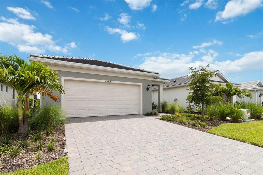 Front exterior of a new home in , Englewood, FL, highlighting curb appeal (Image 22).