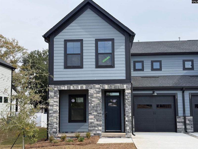 Front exterior of a new home in Dunbar Village, Cayce, SC, highlighting curb appeal (Image 2). Front exterior of a new home in Dunbar Village, Cayce, SC, highlighting curb appeal (Image 2).