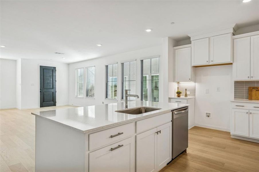 The chef in the family will never be left out of the party in this wonderful open concept floor plan!