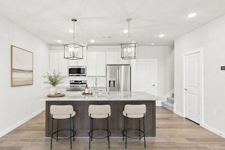 Furnished interior view inside a new home in Wildridge, Oak Point (Image 8).
