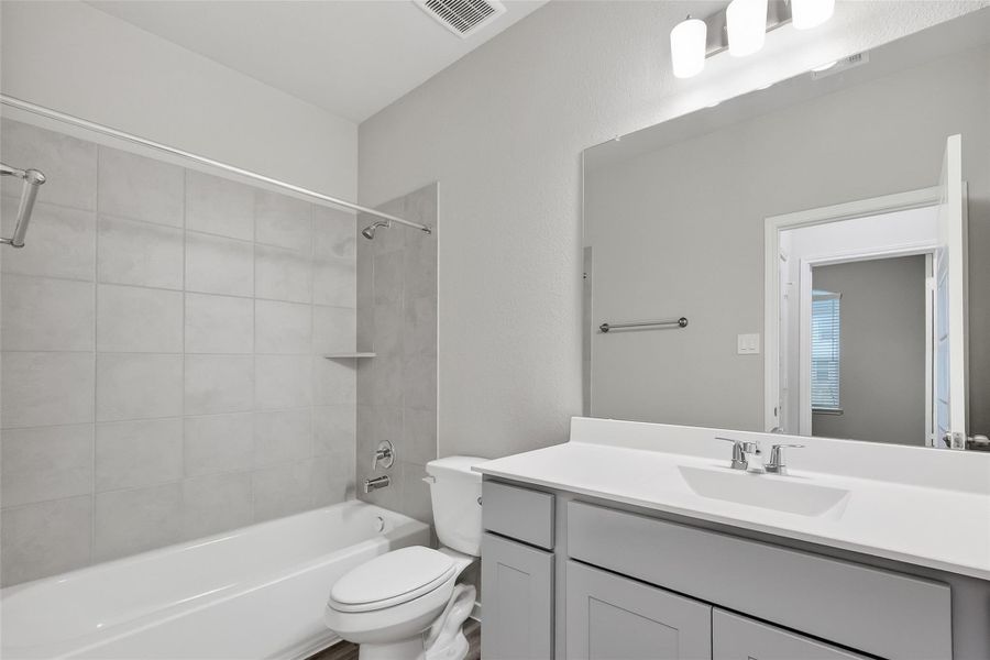 Furnished interior view inside a new home in Rollingbrook Estates, Baytown (Image 14).