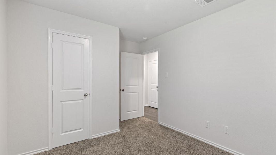 Spacious, unfurnished interior of a new home in Stonewyck Farms, Ennis (Image 19).