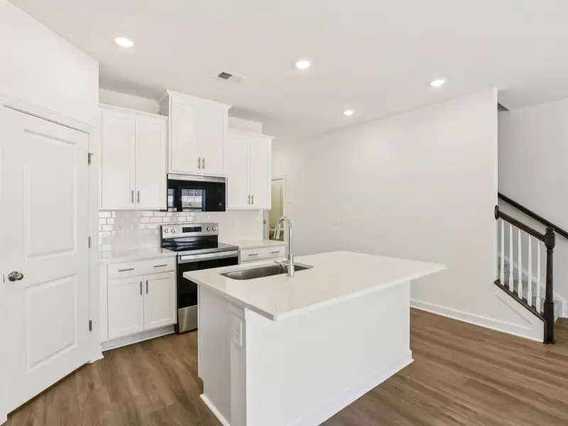 Furnished interior view inside a new home in Rocky River Towns, Charlotte (Image 4).