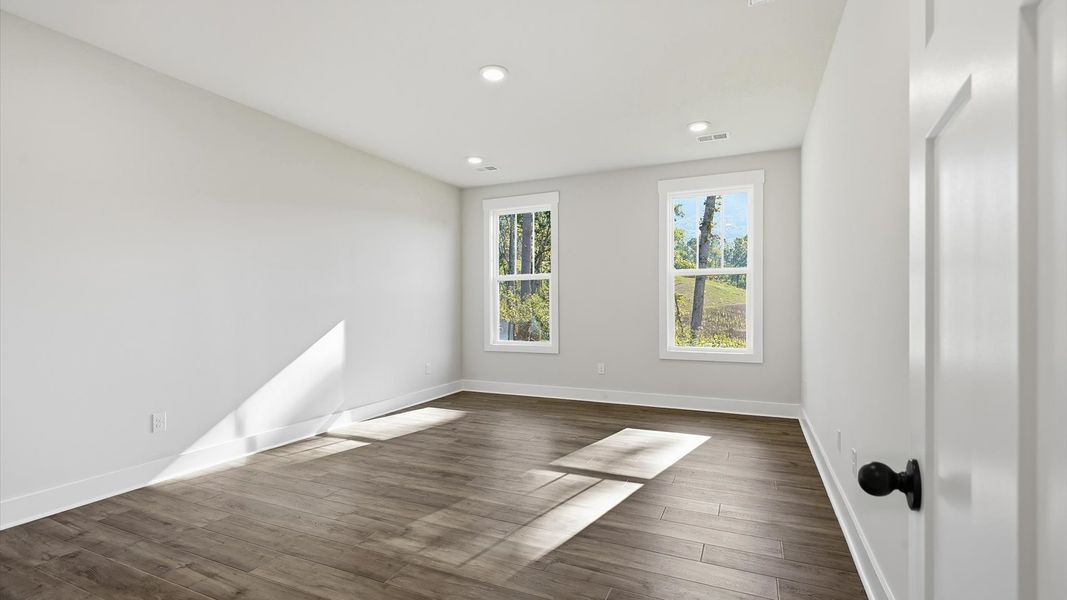 Memorable mornings begin in this tasteful and thoughtfully crafted primary suite