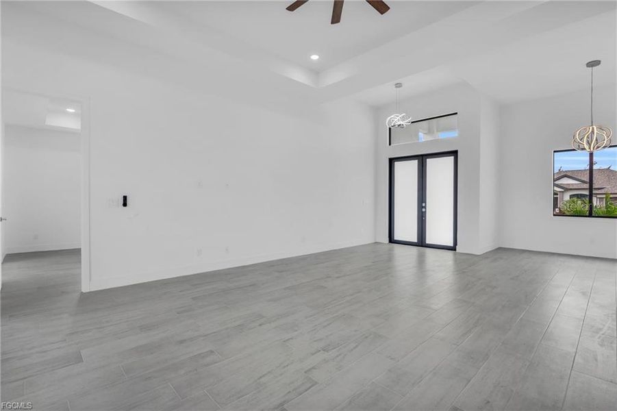 Spacious, unfurnished interior of a new home in , Port Charlotte (Image 27).