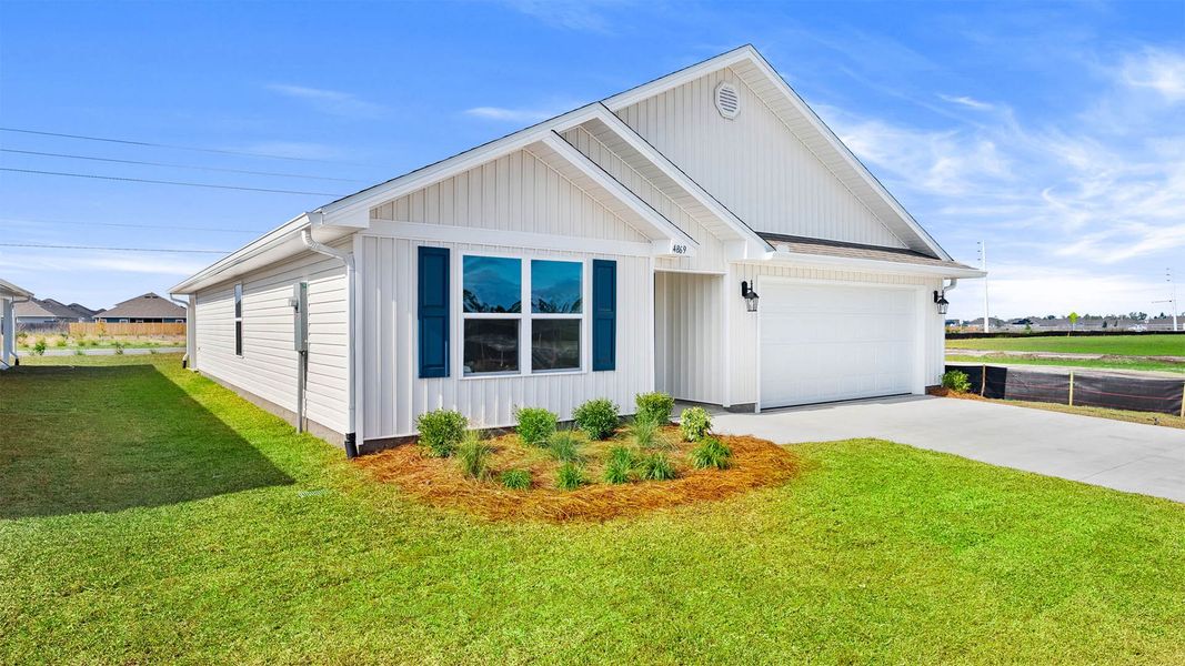 Front exterior of a new home in Titus Park, Panama City, FL, highlighting curb appeal (Image 16).
