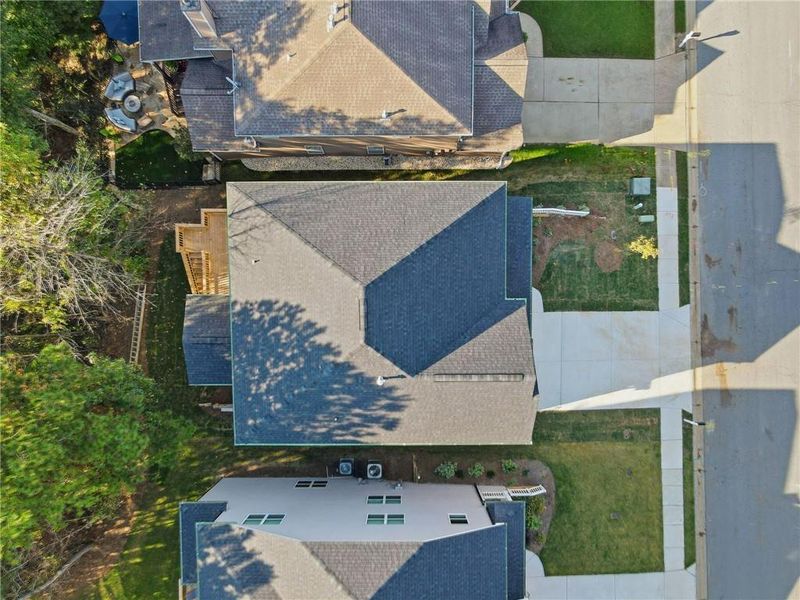 Front exterior of a new home in , Canton, GA, highlighting curb appeal (Image 26).