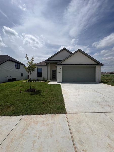 Front exterior of a new home in Stillwater Lake Estates, Godley, TX, highlighting curb appeal (Image 1). Front exterior of a new home in Stillwater Lake Estates, Godley, TX, highlighting curb appeal (Image 1).