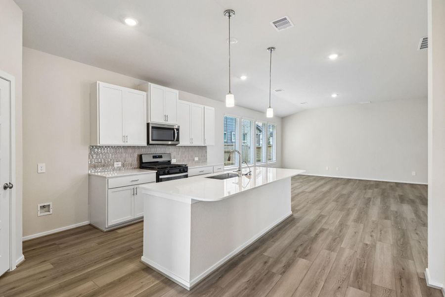 Furnished interior view inside a new home in Massey Oaks Village, Pearland (Image 10). Furnished interior view inside a new home in Massey Oaks Village, Pearland (Image 10).