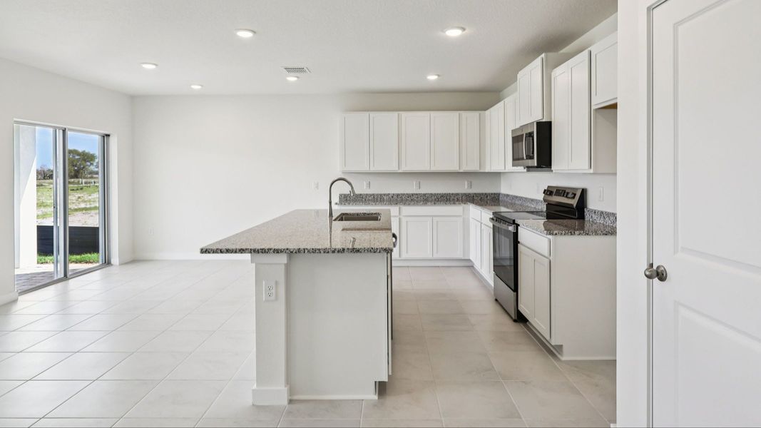 Representative furnished interior of a home built from the Baker by DRB Homes in Willowbrook North, Winter Haven (Image 13).
