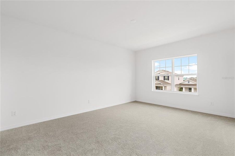Spacious, unfurnished interior of a new home in Osprey Ranch Townhomes, Winter Garden (Image 13).