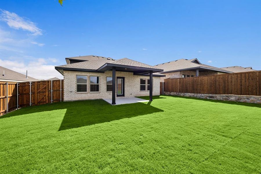 Exterior details and patio area of a home in Aspire at Noble Ridge, Howe (Image 3).