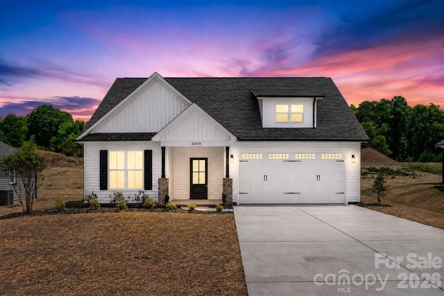 Front exterior of a new home in , Albemarle, NC, highlighting curb appeal (Image 19).