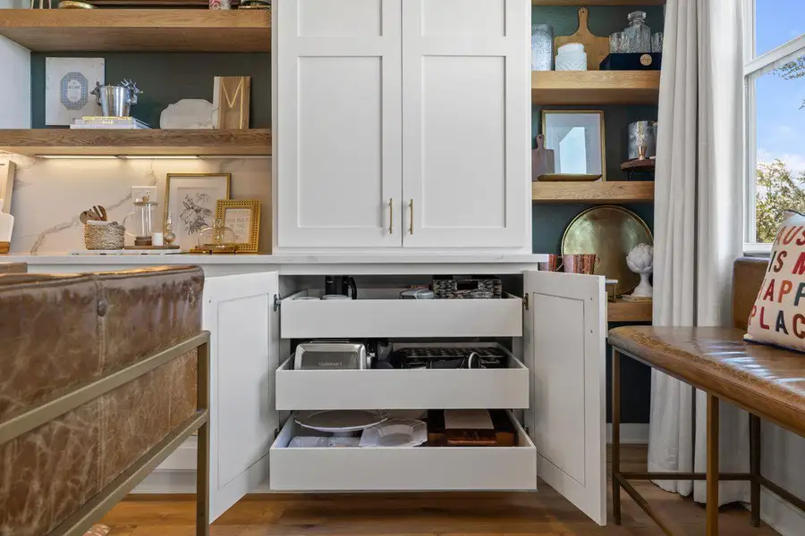 These pull-out drawers are deep enough for small appliances, dishes, and more These pull-out drawers are deep enough for small appliances, dishes, and more
