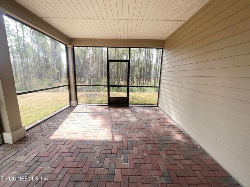 Exterior details and patio area of a home in Tributary, Yulee (Image 2).
