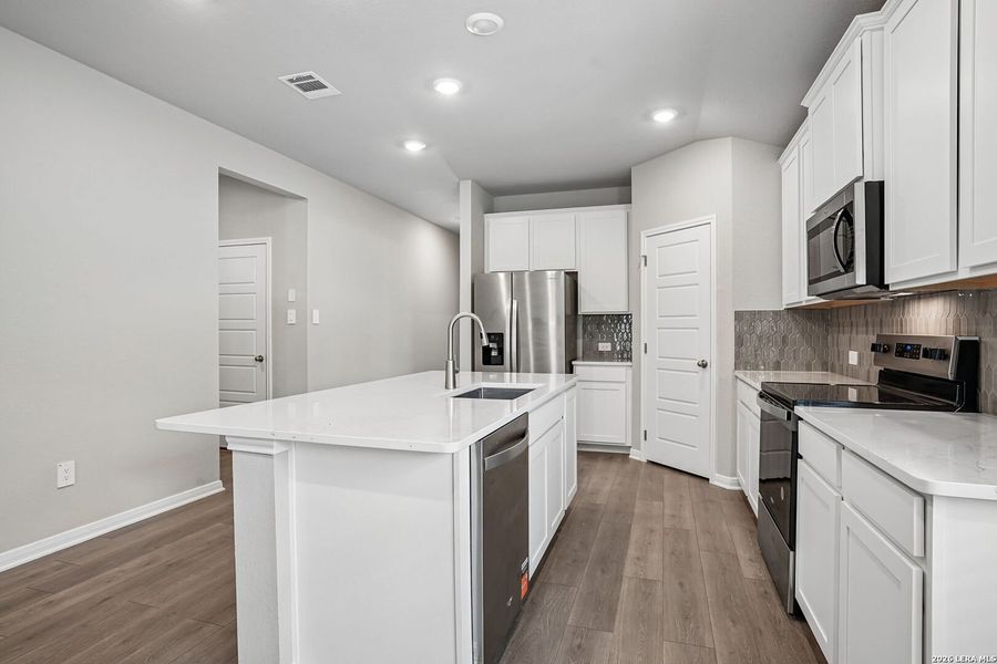 Furnished interior view inside a new home in Legendary Trails - Premier Series, Cibolo (Image 6).
