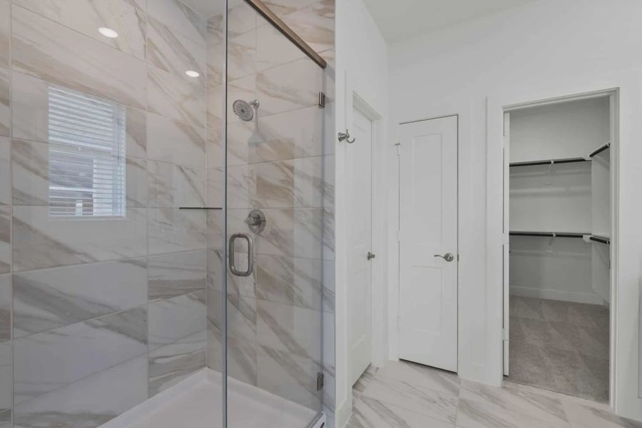 Representative furnished interior of a home built from the Riverdale by Chesmar Homes in Meridiana Courtyard Collection, Manvel (Image 10).