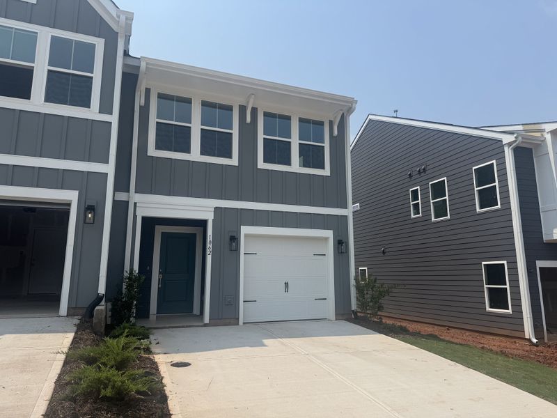 Front exterior of a new home in Sweetbrier, Durham, NC, highlighting curb appeal (Image 1). Front exterior of a new home in Sweetbrier, Durham, NC, highlighting curb appeal (Image 1).