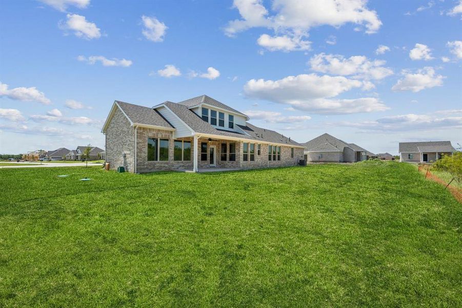Exterior details and patio area of a home in Ellis Ranch Estates, Waxahachie (Image 4).