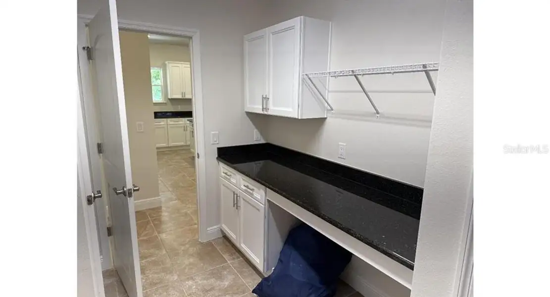 Furnished interior view inside a new home in , North Port (Image 3).