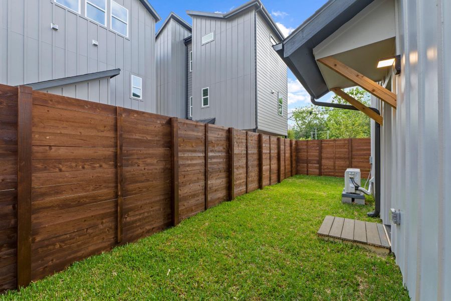 View of fenced backyard