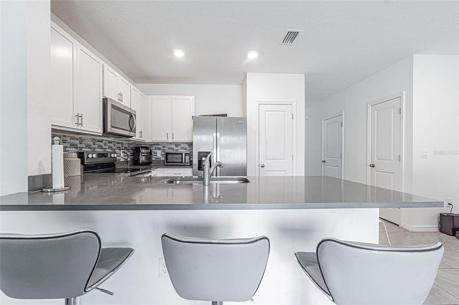 Furnished interior view inside a new home in Chelsea Court, Tampa (Image 6).