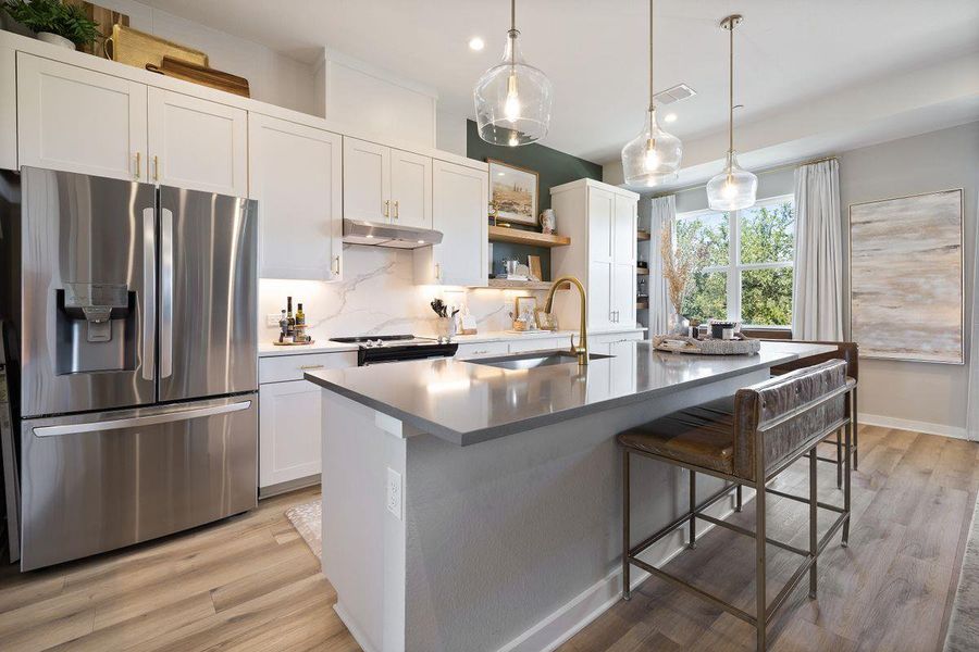 Love these floors and the pendant lighting. Refrigerator will not stay with the condo. Love these floors and the pendant lighting. Refrigerator will not stay with the condo.