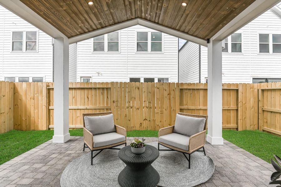 Exterior details and patio area of a home in Antigua, Houston (Image 3).