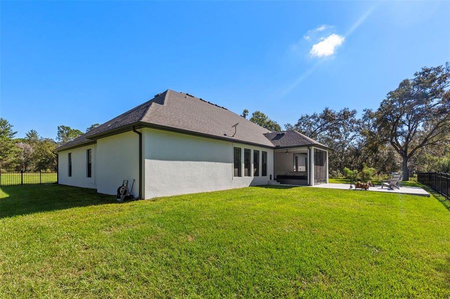 Exterior details and patio area of a home in Bella Terra, Hudson (Image 2). Exterior details and patio area of a home in Bella Terra, Hudson (Image 2).