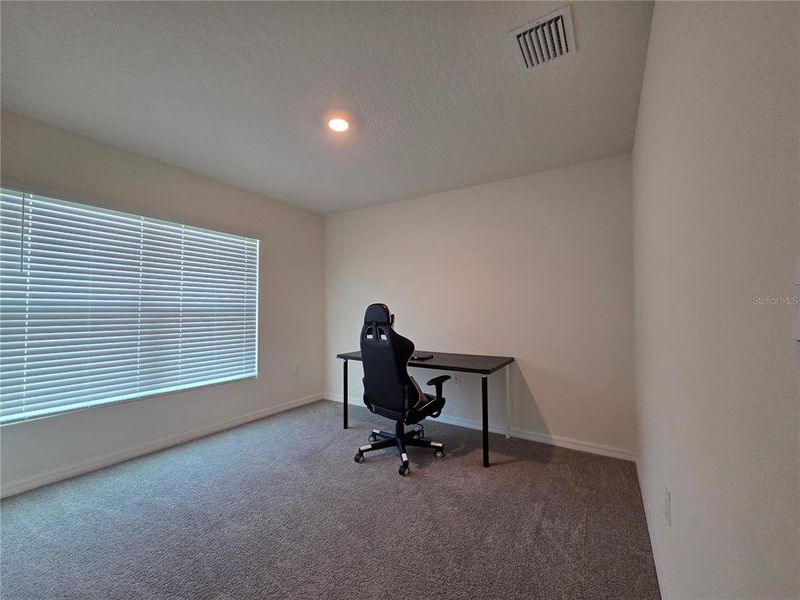 Furnished interior view inside a new home in Hernando County Spot Lots, Spring Hill (Image 34).
