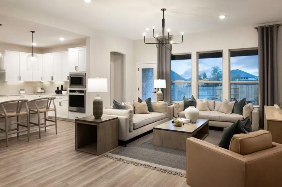 Photo of Pulte model home with same floor plan, not of actual home listed.