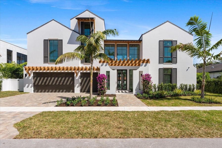 Front exterior of a new home in , Boca Raton, FL, highlighting curb appeal (Image 51). Front exterior of a new home in , Boca Raton, FL, highlighting curb appeal (Image 51).