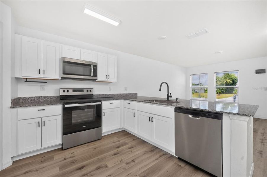 Furnished interior view inside a new home in , Port Charlotte (Image 13).